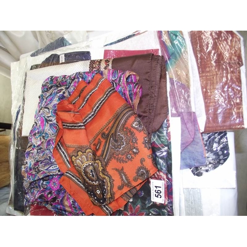 561 - 12 vintage silk scarves and 3 other vintage scarves.