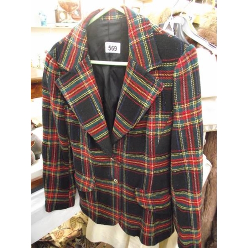 569 - A vintage tartan jacket with gilt buttons together with a vintage Jaeger tweed skirt and a multicolo... 