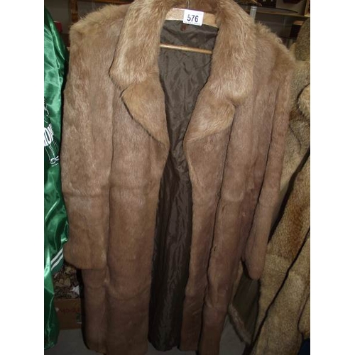 576 - A fur coat. (in good condition).