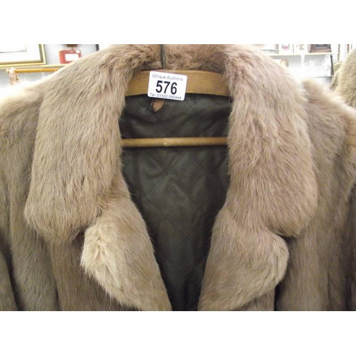 576 - A fur coat. (in good condition).