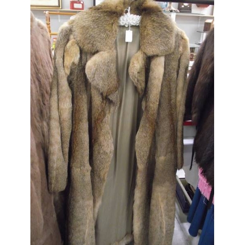 577 - A fur coat. (in good condition).