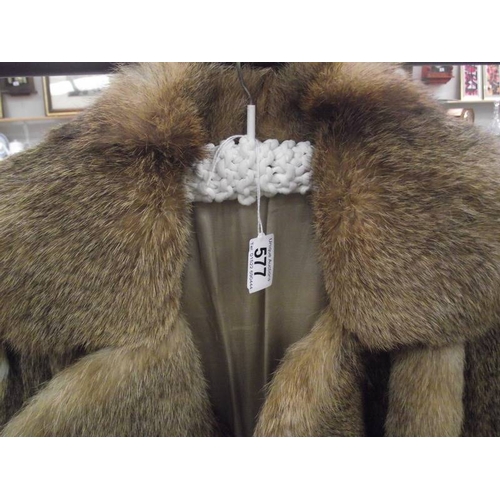 577 - A fur coat. (in good condition).