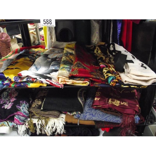 588 - A vintage head, scarves, tights, gloves, gaiters etc.,