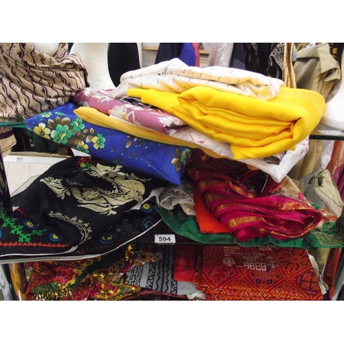 594 - A quantity of Indian Sari's etc.,