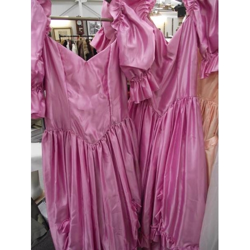 596 - 3 vintage bridesmaid dresses and a wedding dress.