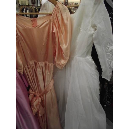 596 - 3 vintage bridesmaid dresses and a wedding dress.