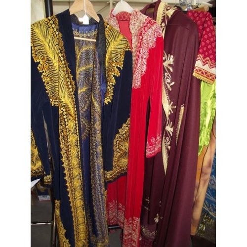 602 - A good selection of male and female Indian clothing.