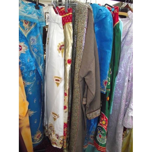 602 - A good selection of male and female Indian clothing.