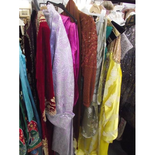 602 - A good selection of male and female Indian clothing.