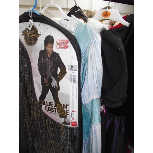 603 - A good selection of fancy dress costumes.