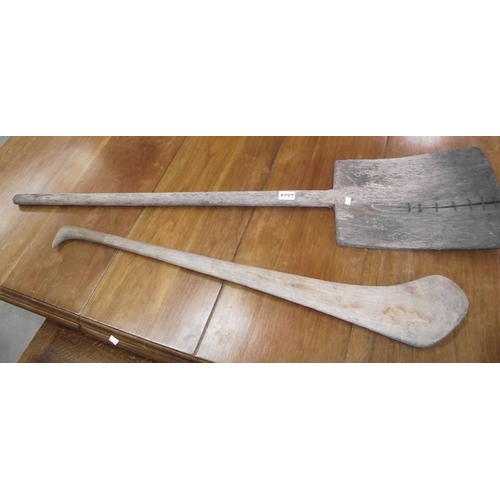 620A - An old wooden shovel and another wooden implement.