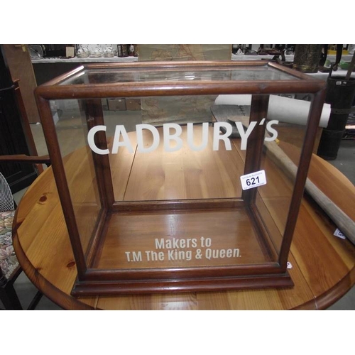 621 - A table top display cabinet with Cadbury advertising.