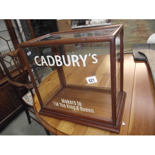 621 - A table top display cabinet with Cadbury advertising.