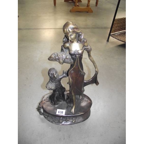 638 - An art nouveau style bronze mother and child, 18'' tall.