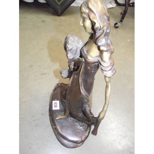 638 - An art nouveau style bronze mother and child, 18'' tall.