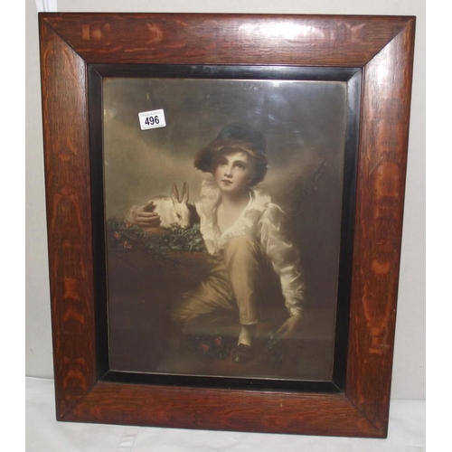 496 - An oak framed Pears style print of boy and rabbit