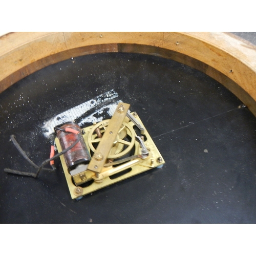 661 - A double faced electric railway clock, movement needs attention, i.e rewiring. Depth 15cm Diameter 4... 