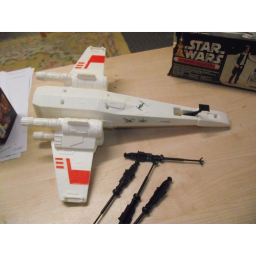 288 - A boxed Palitoy Star Wars Land Speeder and X wing fighter, (unchecked for completeness and in played... 