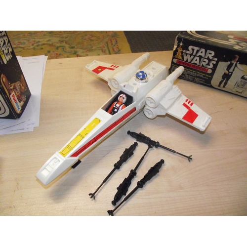 288 - A boxed Palitoy Star Wars Land Speeder and X wing fighter, (unchecked for completeness and in played... 