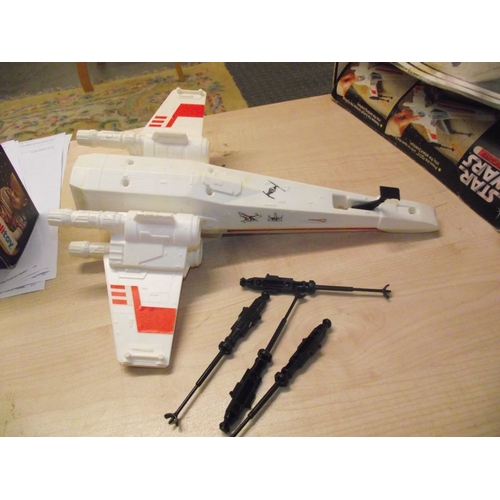 288 - A boxed Palitoy Star Wars Land Speeder and X wing fighter, (unchecked for completeness and in played... 