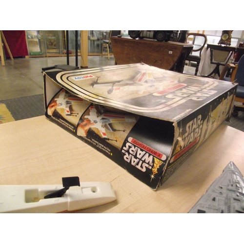 288 - A boxed Palitoy Star Wars Land Speeder and X wing fighter, (unchecked for completeness and in played... 