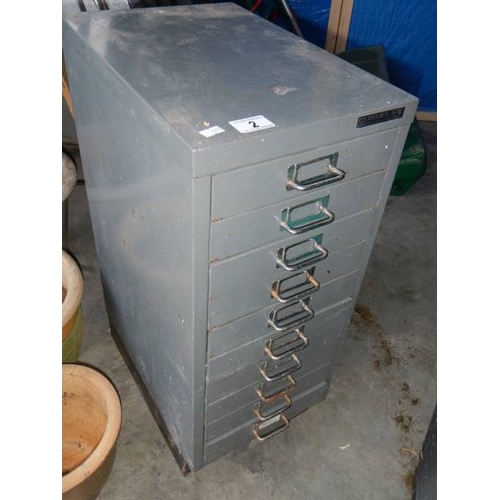 2 - A small 10 drawer metal cabinet.