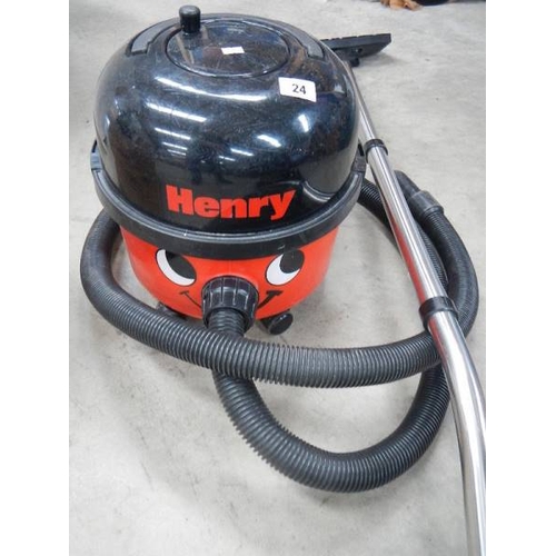 24 - A Henry vacuum cleaner.