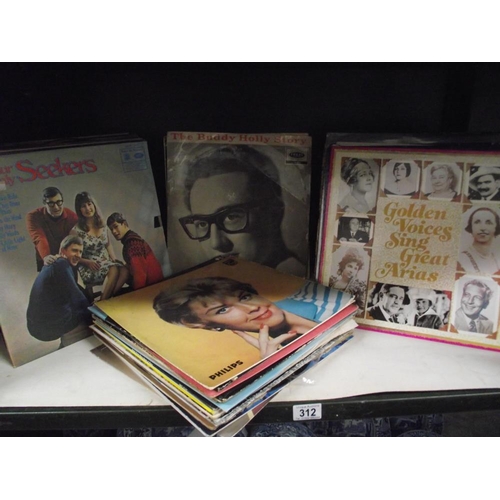 312 - A selection of Lp vinyl records including The Seekers, Buddy Holly etc.