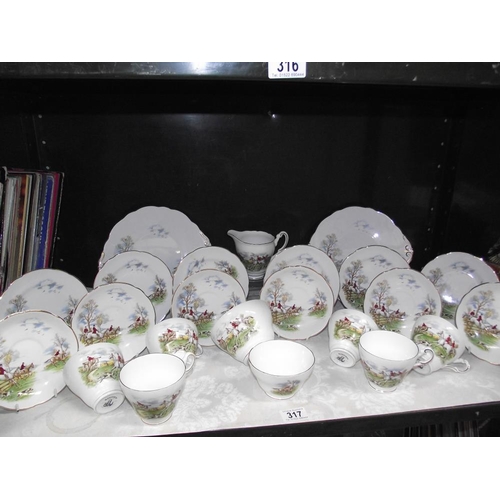 317 - A Regency bone china tea set with hunting scene