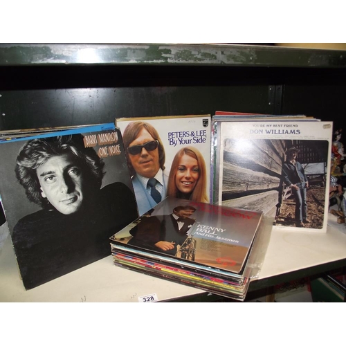 328 - A quantity of LP vinyl records including Peters and Lee, Barry Manilow etc.