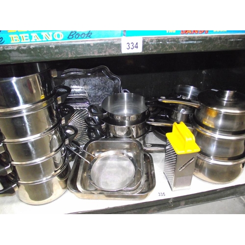 335 - A large selection of stainless steel saucepans, mostly unused