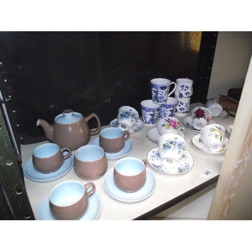 343 - A Langley pottery teaset and selection of floral porcelain cups and saucers etc.