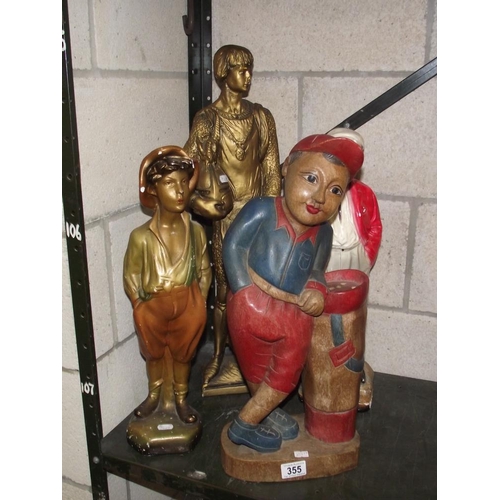 355 - 3 1930's painted plaster figures including whistling boy and a painted wooden figure of a golfer