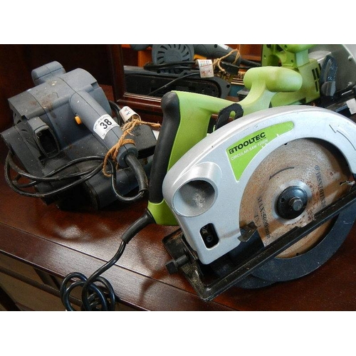 38 - A hand sander and a 1200w circular saw.