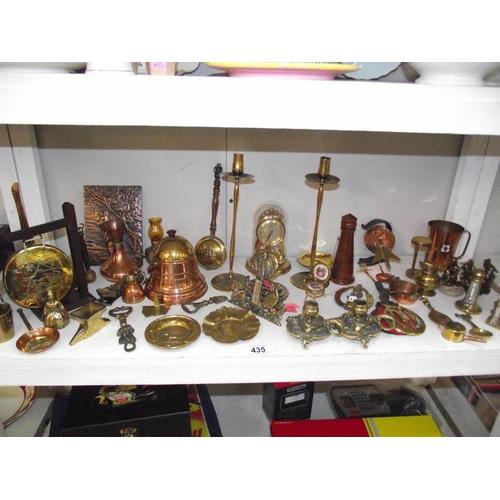 435 - A selection of brass and copper ornaments etc.