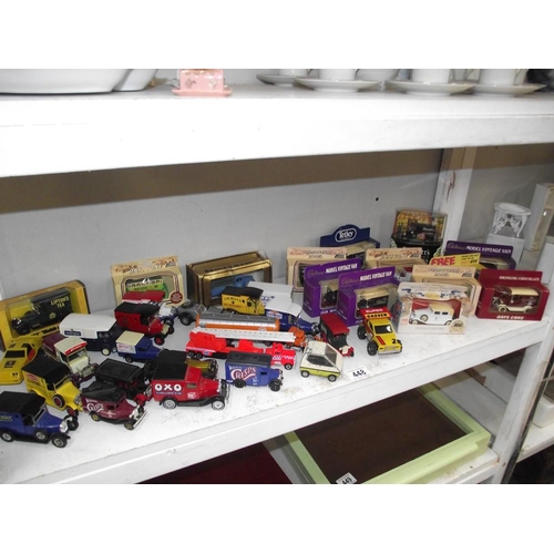 448 - A shelf of diecast cars, some boxed