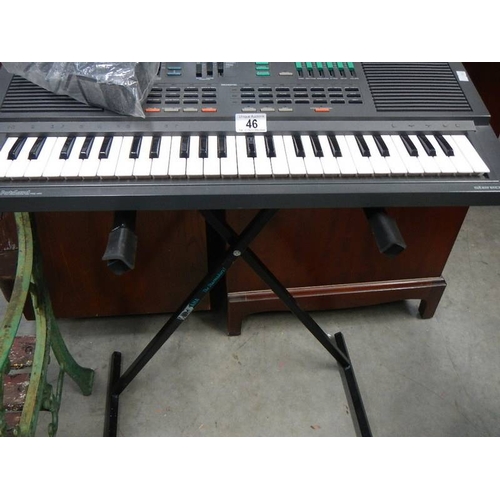 46 - A freestanding Yamaha Parta sound keyboard.