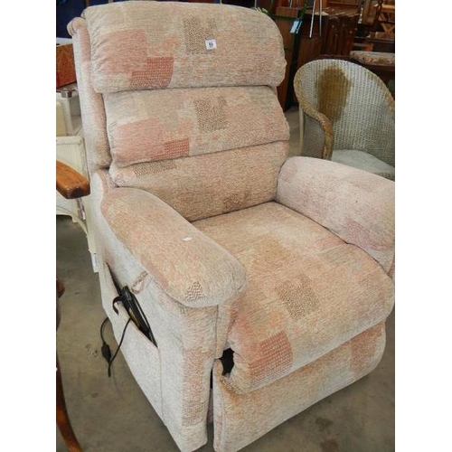 59 - An electric recliner chair.