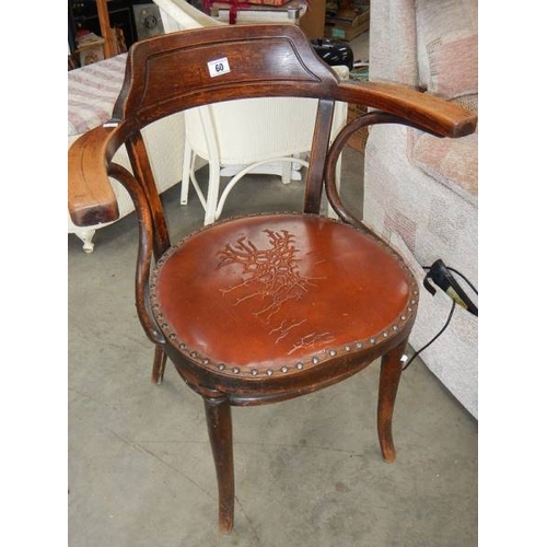 60 - An old elbow chair.