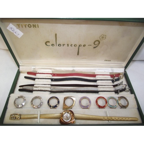 473 - A boxed Titoni colorscope 9 wristwatch with interchangeable bezels and straps