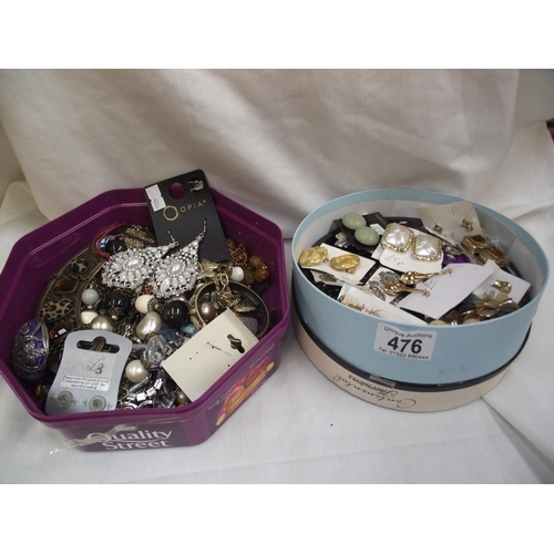 476 - 2 tins of costume jewellery