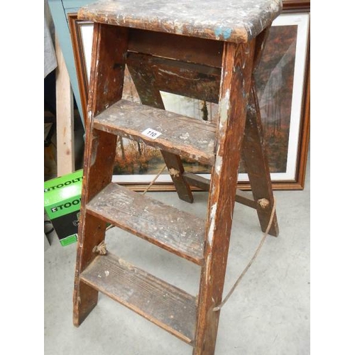 110 - A small old step ladder.