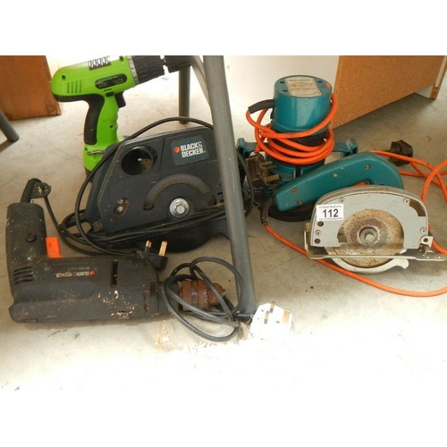 112 - A mixed lot of good tools including router, Black & Decker, saws etc.,