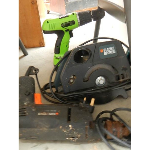 112 - A mixed lot of good tools including router, Black & Decker, saws etc.,