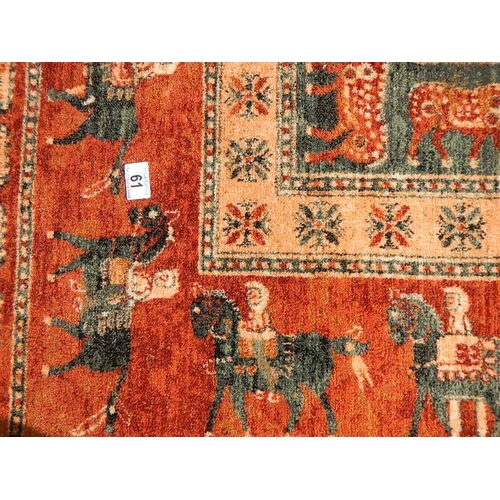 61 - A machine made carpet with men on horses, 300 x 200 cm.