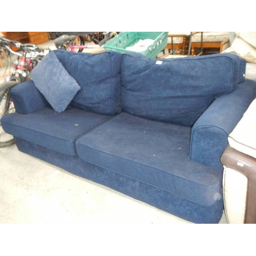 78 - A blue sofa.