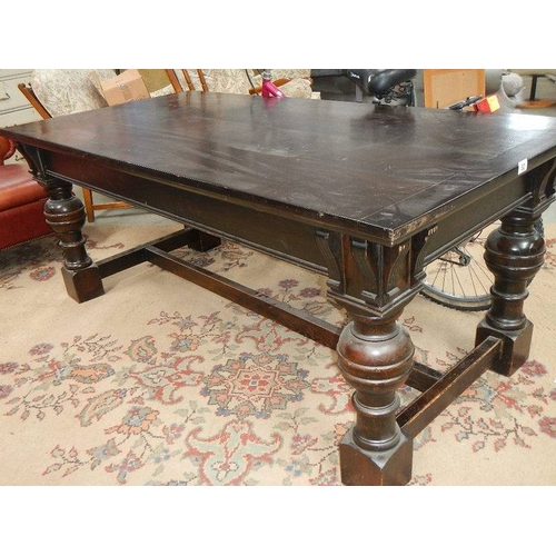 82 - A large dark oak refrectory table.