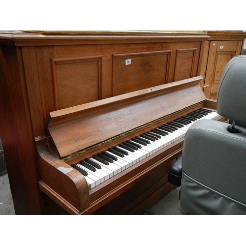 86 - An upright piano.