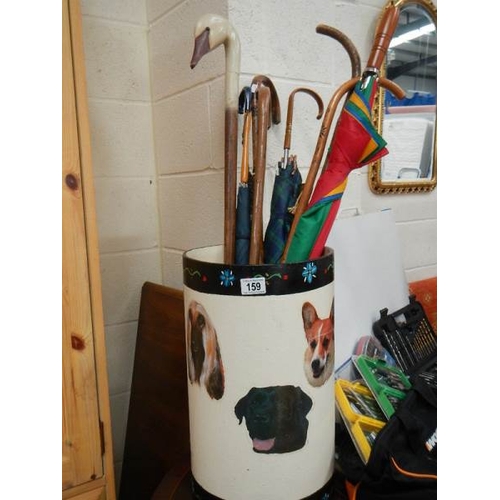 159 - An umbrella stand and umbrella's etc.,