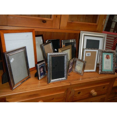 163 - A mixed lot of picture frames including silver plate.